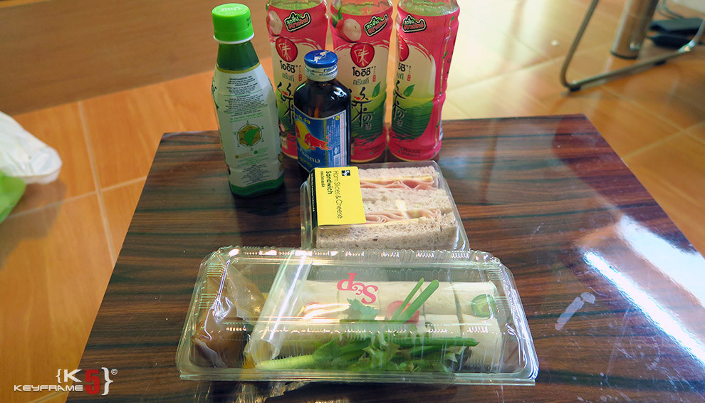 ฿58 THB - Ham cheese sandwich and chicken spring rolls